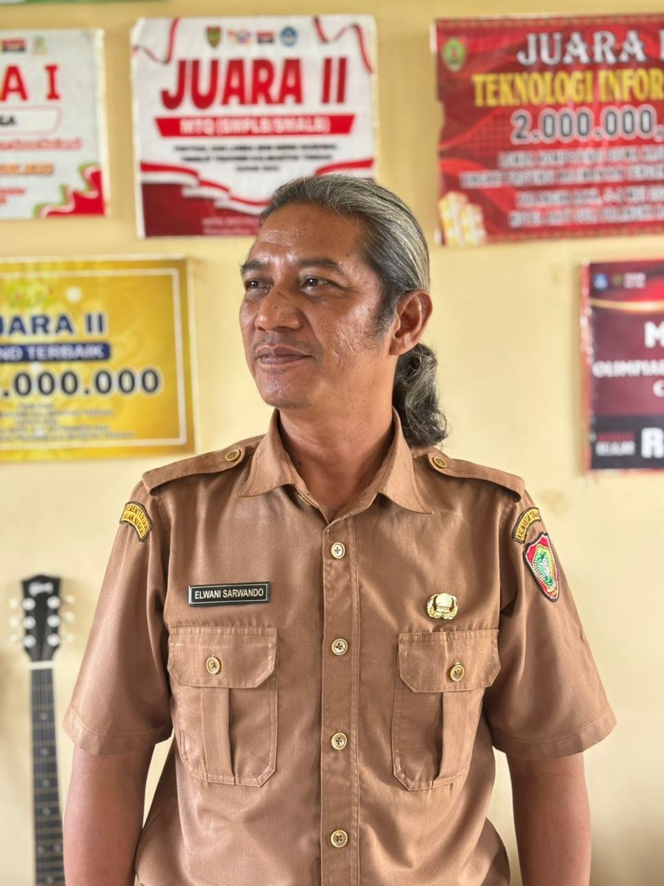 Elwani Sarwando, S.Pd